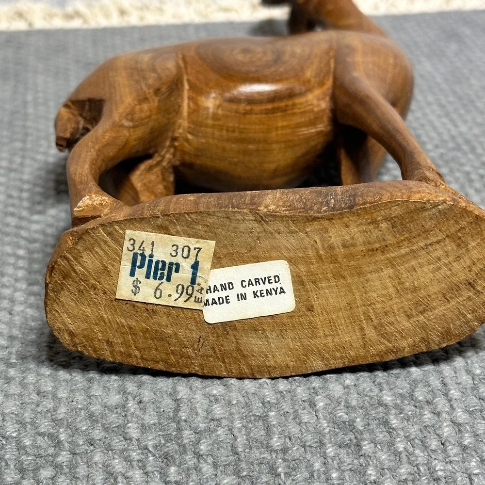 Pier 1 hand carved